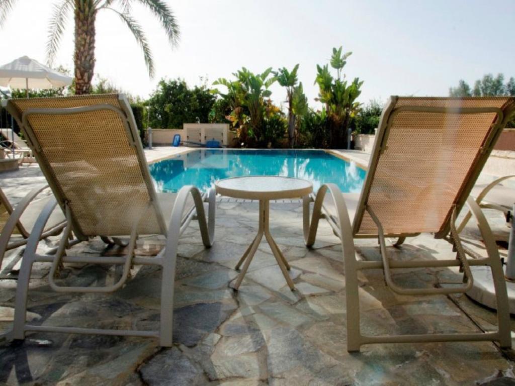 Villa Saraliana Sandy Beach Villas - Heated Pool - Jacuzzi - Private Beach Area Полис Стая снимка